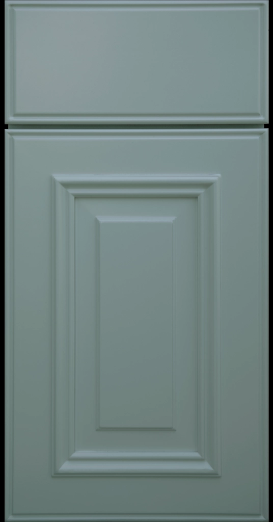 Custom Sage color Anderson Raised Panel Kitchen Cabinet Door and matching Slab Drawer Front.